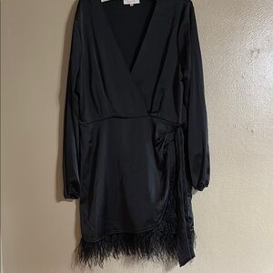 Elegant Black Wrap Dress with Feather Hem